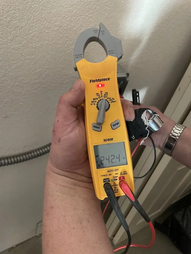 Voltage testing with clamp meter during Electrical Installation Services in Independence